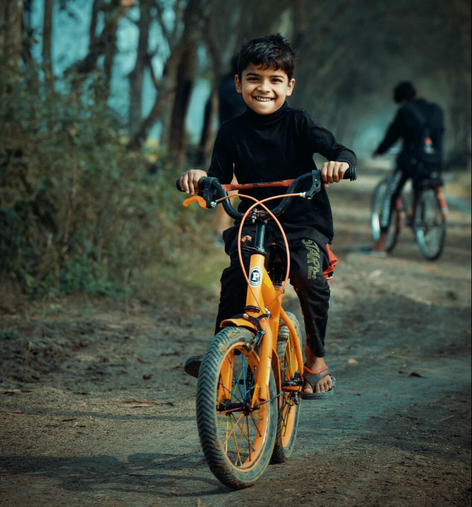photo of boy riding bicycle 3619972 e1592026091524