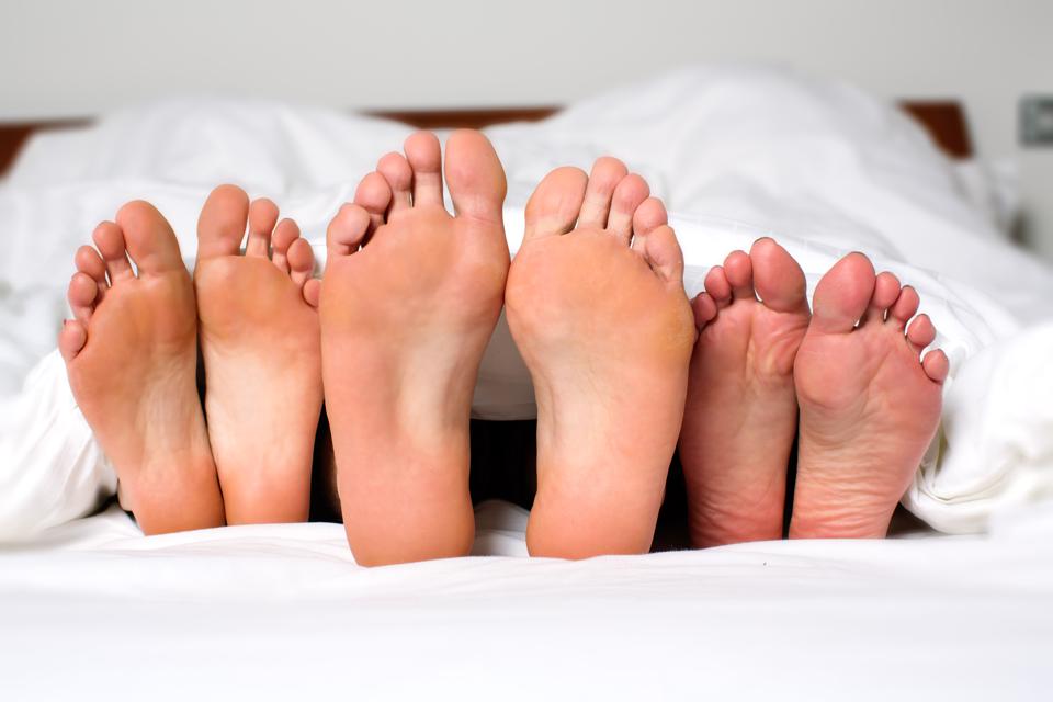 Three Pairs Of Feet