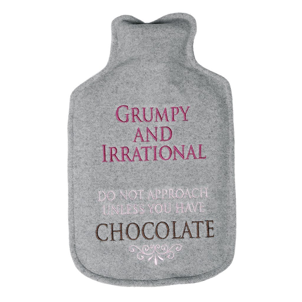 A heat pack embroided with the words: "grumpy and irrational. Do not approach unless you have chocolate". 