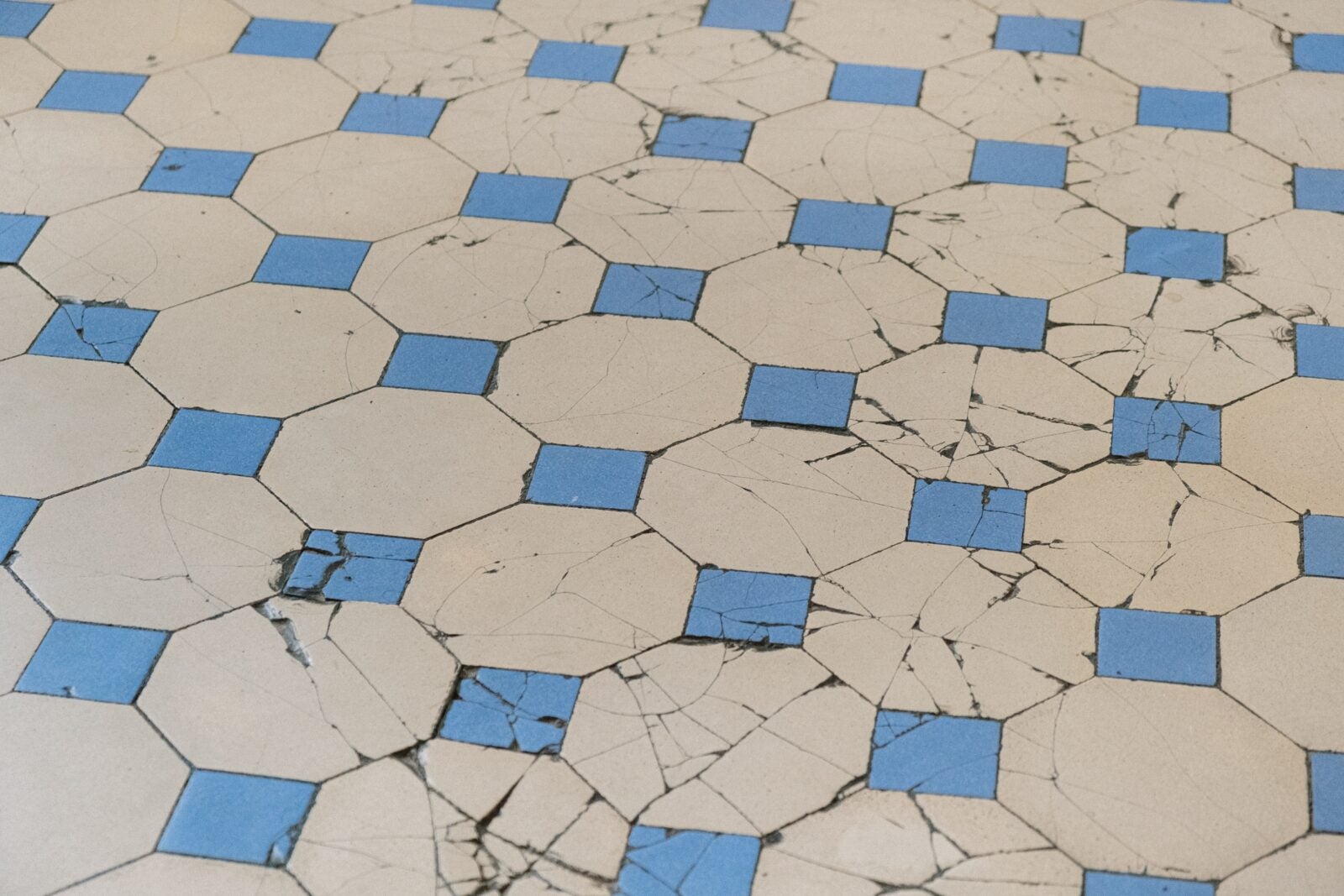 Cracked floor tiles.