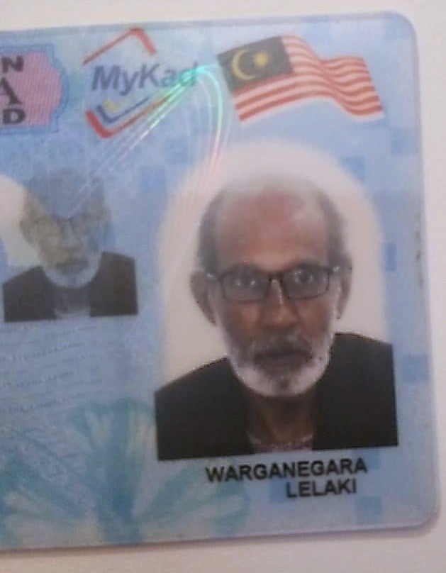 A Malaysian Indian Man on the Malaysian Identification Card.