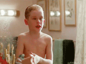 Short clip of the movie, Home Alone where a young boy screams while looking at his reflection.