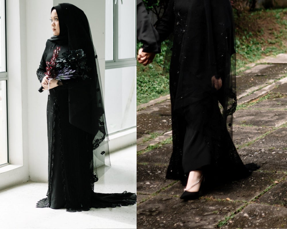 A woman wearing an all black dress, hijab and elegent shoes for her engagement while holding a black themed floral bouquet.