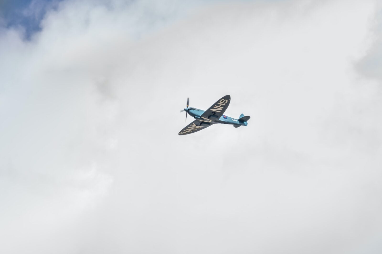 On August 1st, a Spitfire with "Thank You NHS" flew past a series of hospitals here in the South East of England. I only found out minutes before it flew over my garden, and I was able to get a couple of shots showing the message.