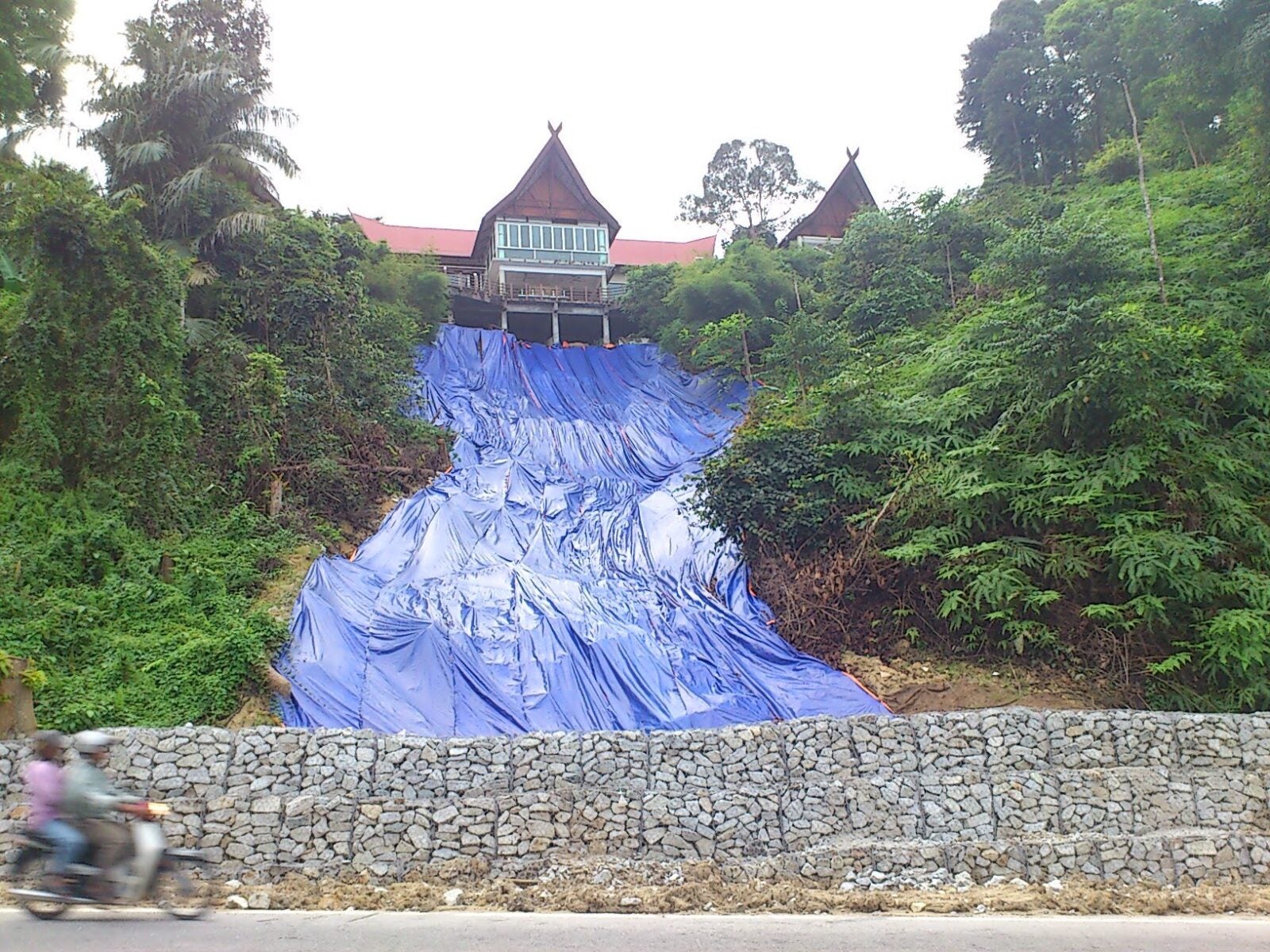 Blue-Tarp-Applied-After-the-2012-Landslide-at-the-abandoned-Ampang-Lookout-Point-in-Kuala-Lumpur