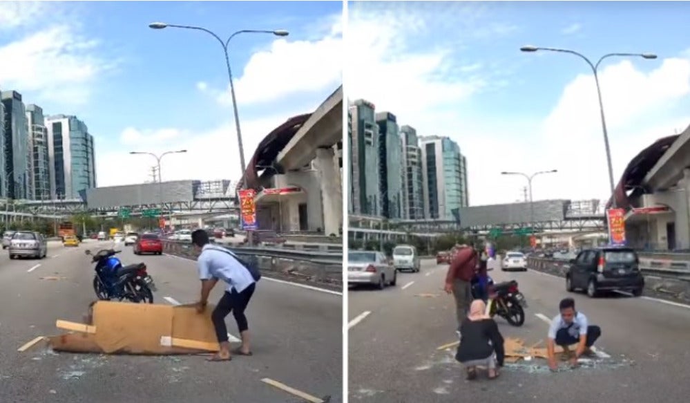 Good Samaritans Pick Up Fallen Broken Glass On The Road. Image Via The Rakyat Post