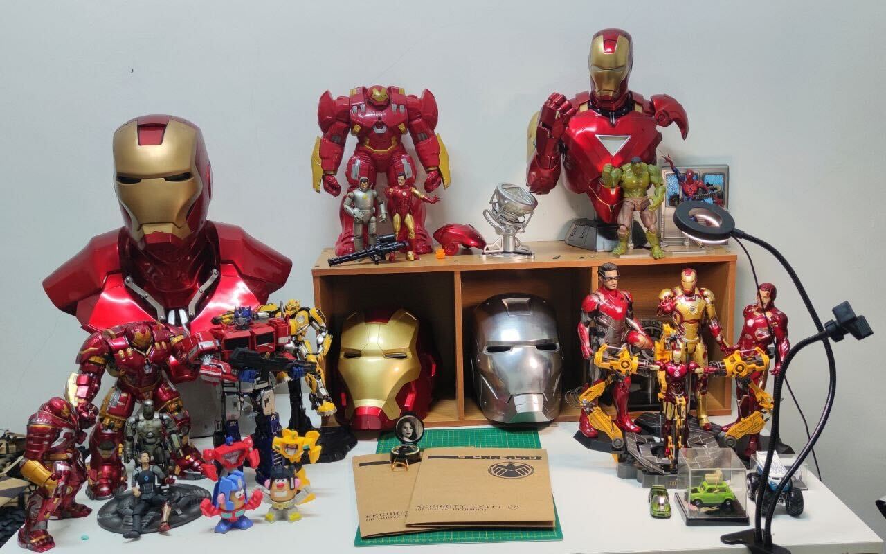 Image: Khairulddin'S Extensive Iron Man Collection, Including His 1:1 Scale Life-Size Iron Man Helmet Made Of 100% Iron.